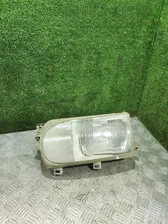 Фара левая Nissan Serena С23 1997