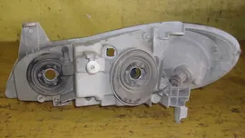 фара Nissan Cefiro правая A33