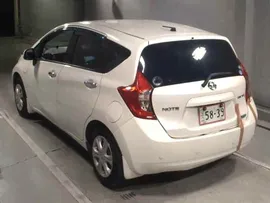 капот Nissan Note E12
