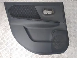Обшивка двери задней левой (дверная карта) Nissan Note