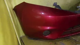 бампер Nissan Note передний NE12