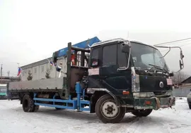 Грузовик манипулятор Nissan Condor 1999 года