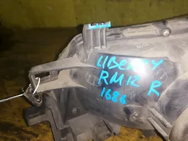 LIBERTY RM12 ФАРА ПРАВАЯ 1686 для Nissan Liberty